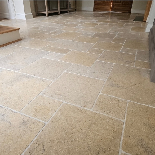 Diamond honing and sealing of limestone floor in Windsor home