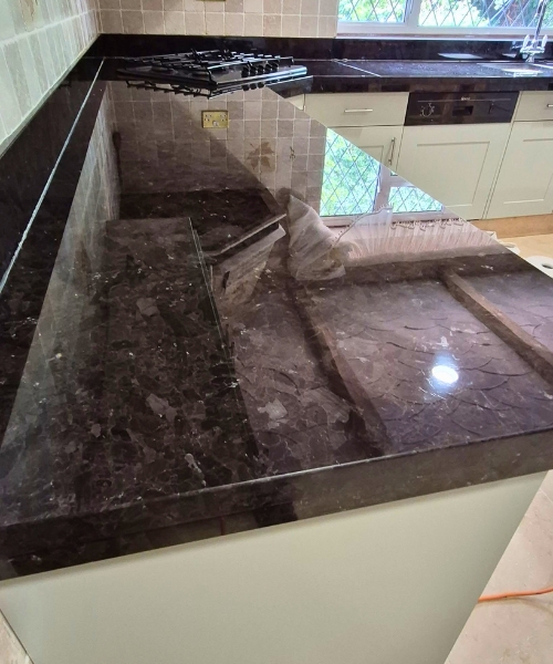 Restored granite kitchen worktop in Wokingham by StoneCura