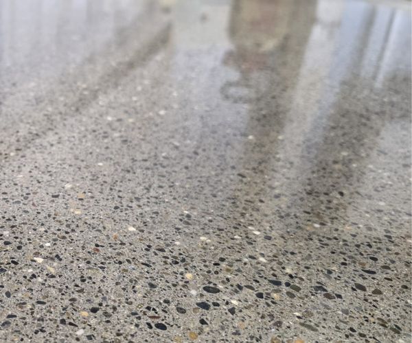 Polished concrete floor after professional service from Stonecura